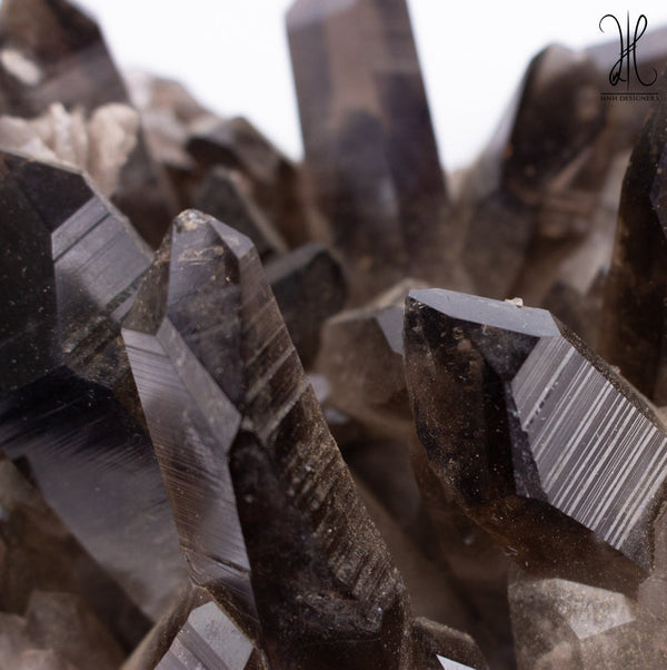 The InterMix Crystal Quartz (DUR E NAJAF) With Smokey Quartz.